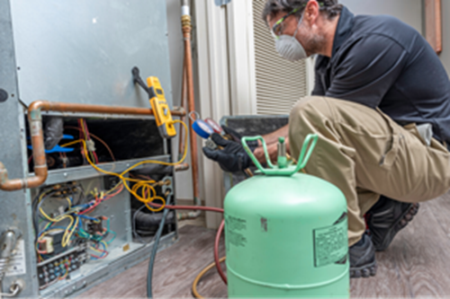 Man performing testing with chiller gas