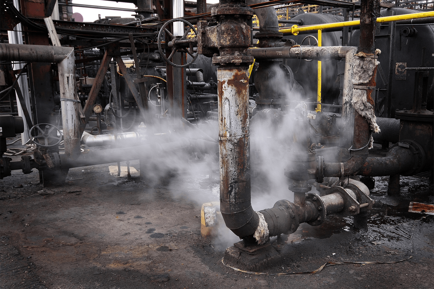 Air leaking out of industrial pipes