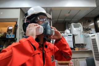 Person in Gas Mask