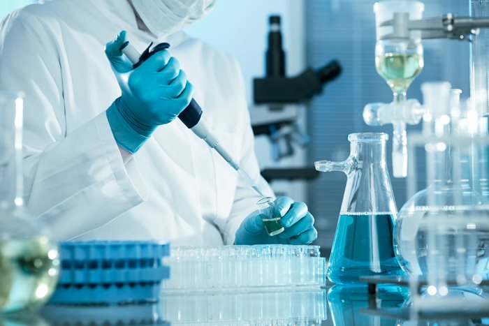 Scientists performing advanced aging testing in a lab environment