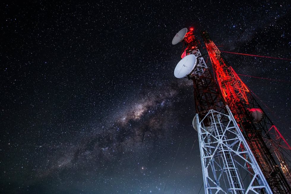 An image of a cell tower at night